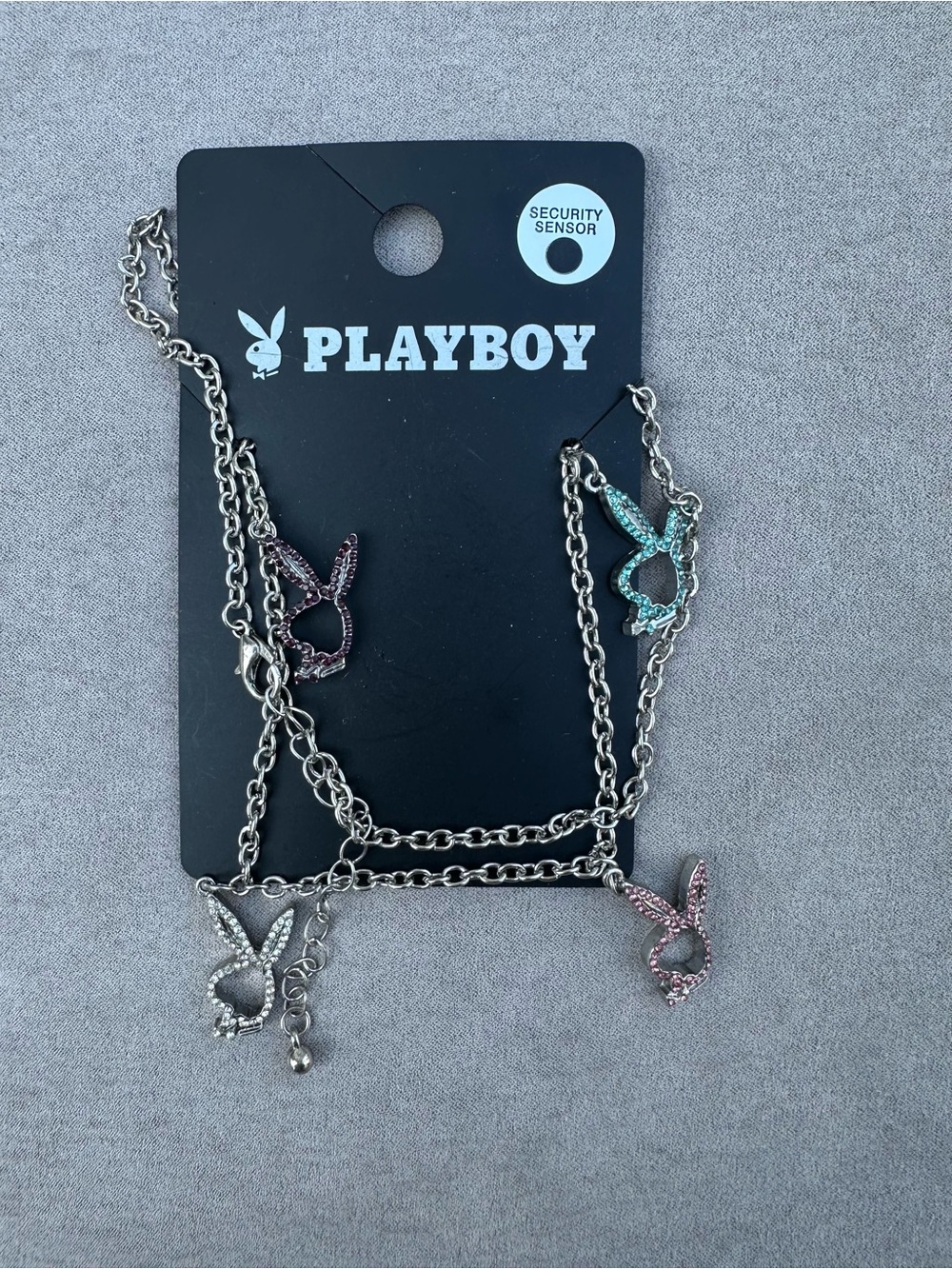 PLAYBOY Silver Necklace with Pink, Teal, Purple Bunny Charms